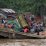 truk terguling di sungai ayak